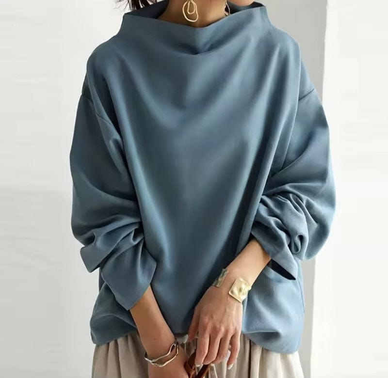 Women's relaxed fit high neck knit top with dropped shoulders, versatile winter staple in classic style