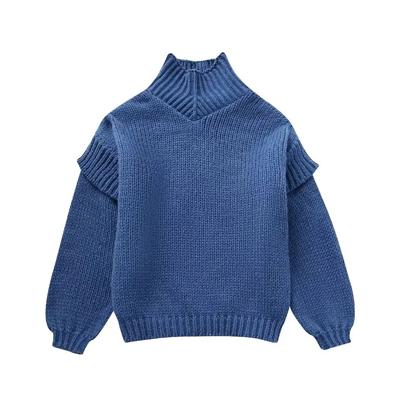 Women's oversized turtleneck knit sweater in cozy soft fabric with relaxed fit and high neckline
