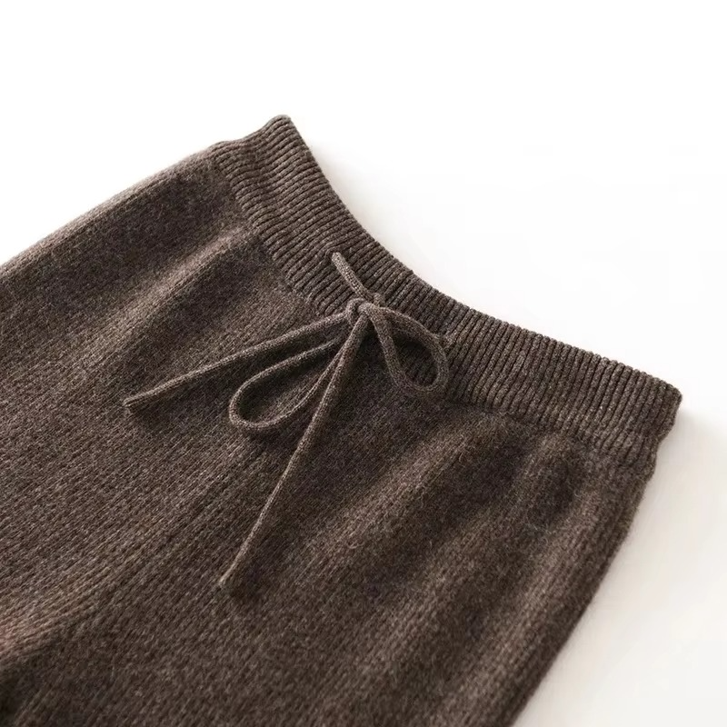 Women's high waist wide leg woolen knit pants in neutral tones with elasticized waistband