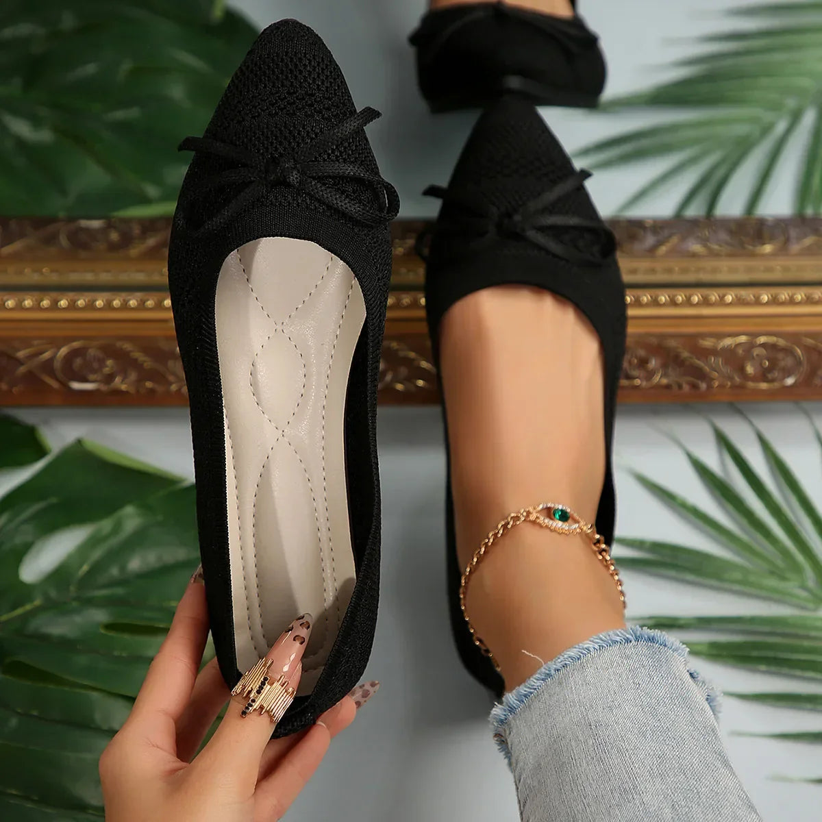Women's knit flats with tassel bow accent, lightweight breathable mesh upper, casual feminine style
