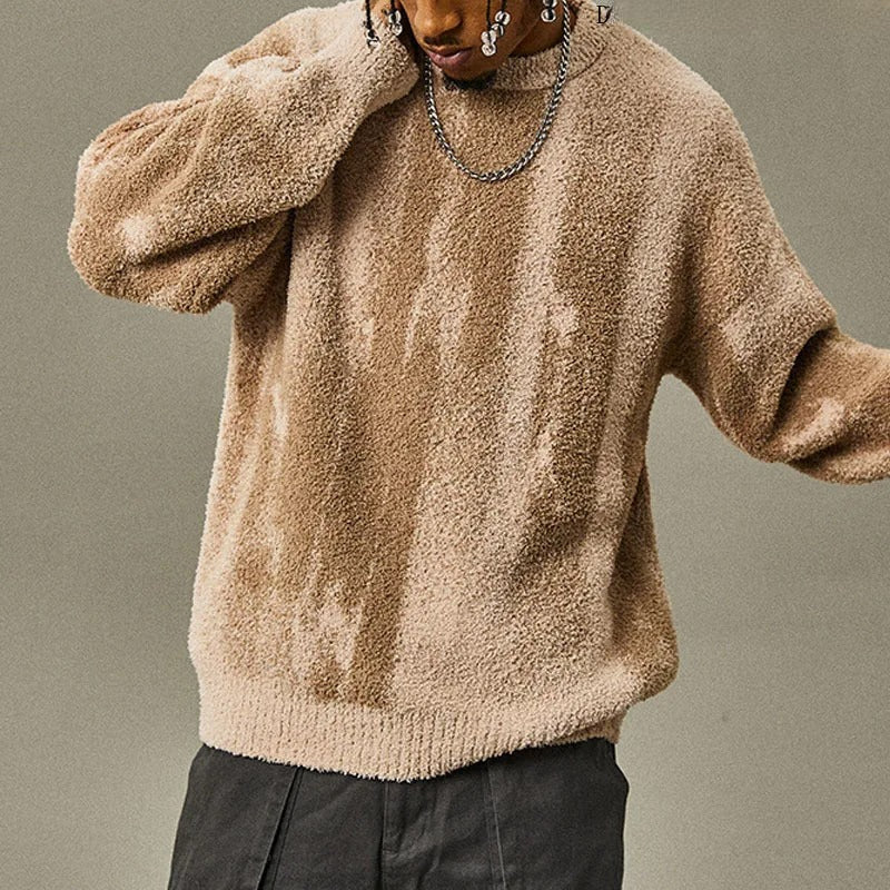 Relaxed fit fleece sweater in soft textured plush fabric for casual layering everyday comfort