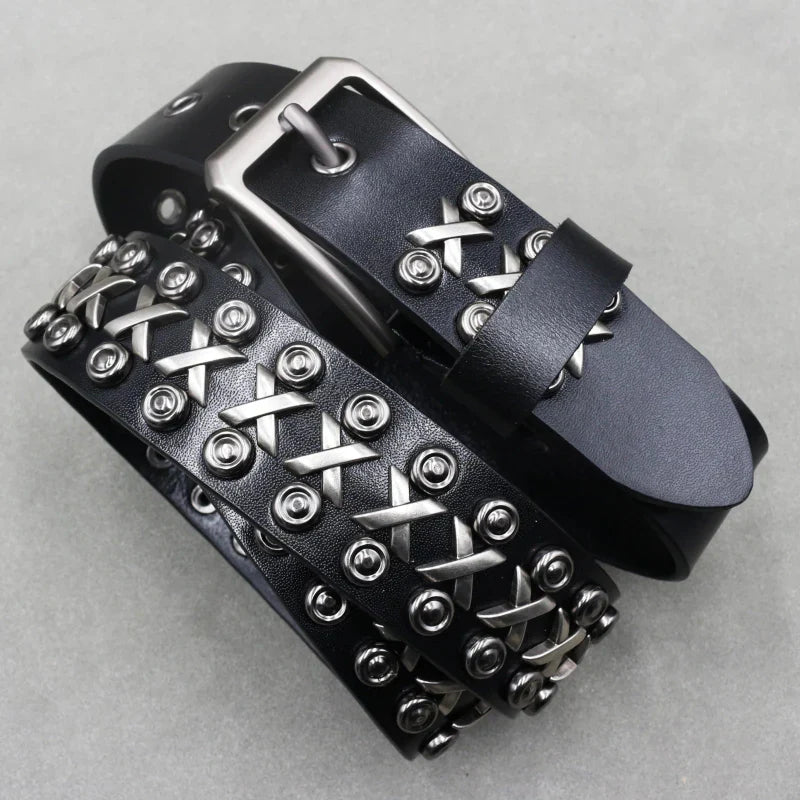 Men's black full-grain leather belt with silver skull studs and adjustable rugged buckle
