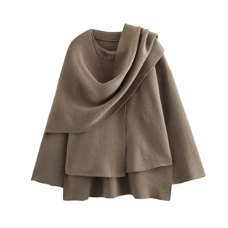Alaia women's oversized winter coat asymmetrical cut plush padding scarf collar cozy chic outerwear