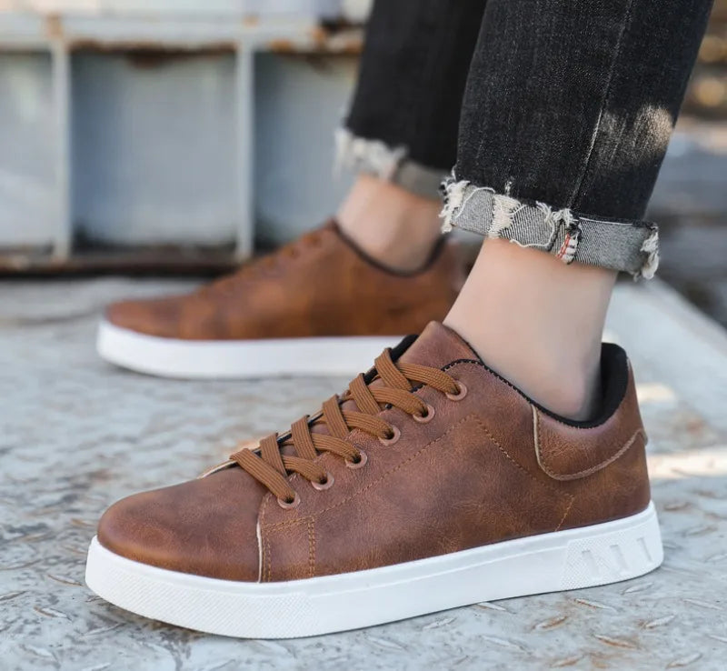 Julian white low-top lace-up vegan leather sneakers with sleek silhouette for men