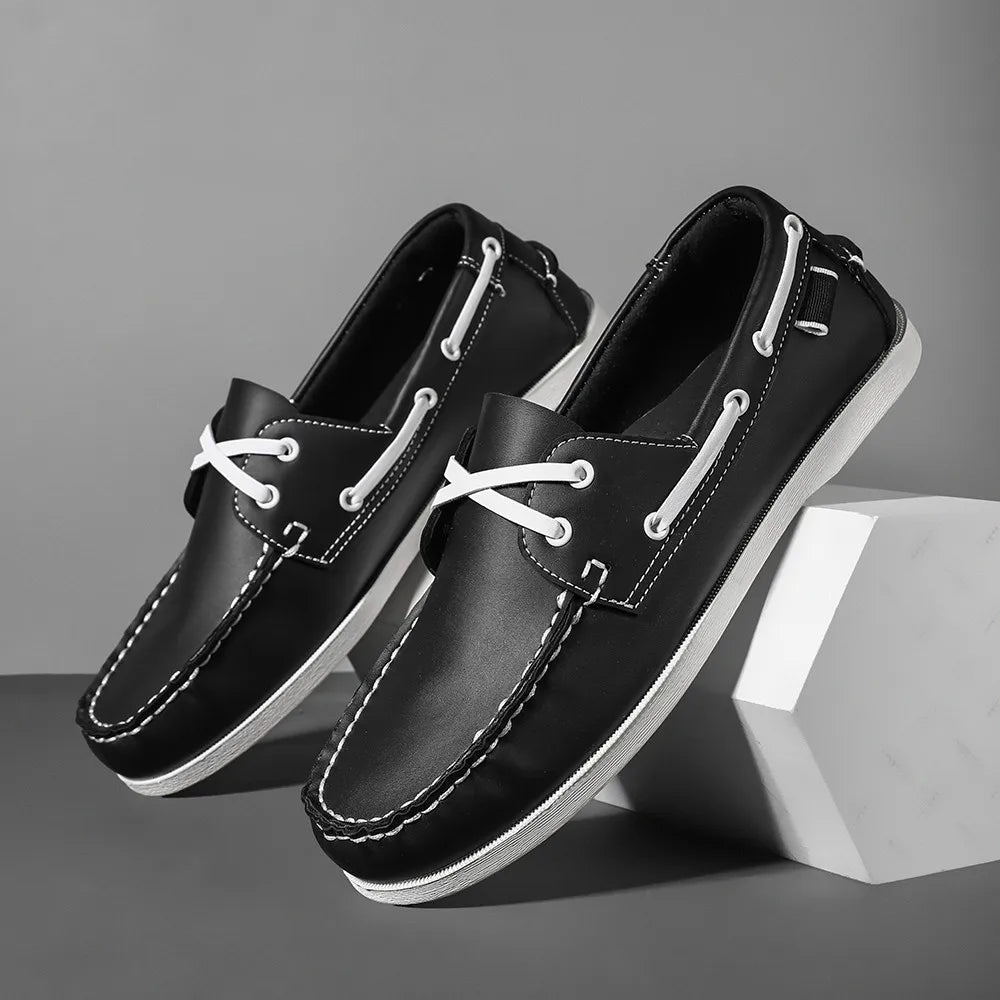 Men's two-tone navy synthetic leather slip-on boat shoes with cushioned EVA foam sole