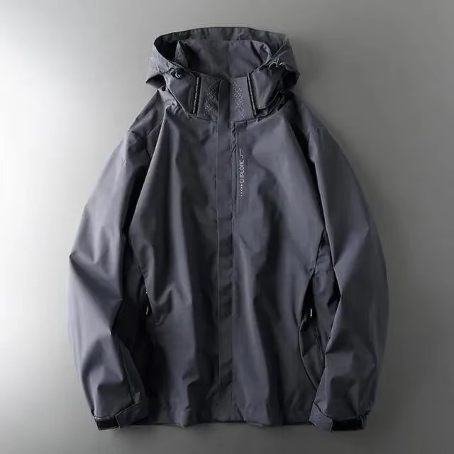 Men's lightweight waterproof windbreaker jacket in neutral tone, slim athletic cut with weather-resistant shell