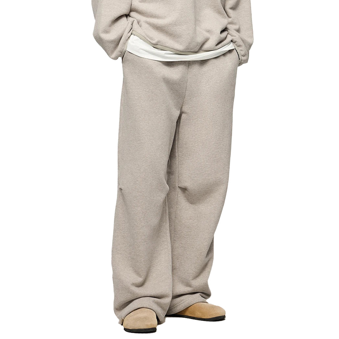 Men's relaxed-fit heavyweight cotton sweatpants in neutral tone with refined drawstring waist