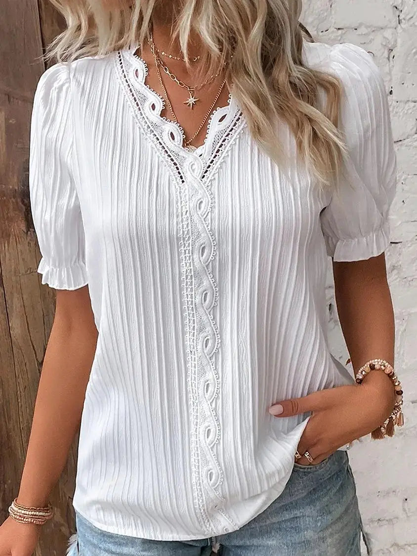 Women's white short-sleeve lace blouse elegant V-neckline lightweight airy silhouette warm-weather top