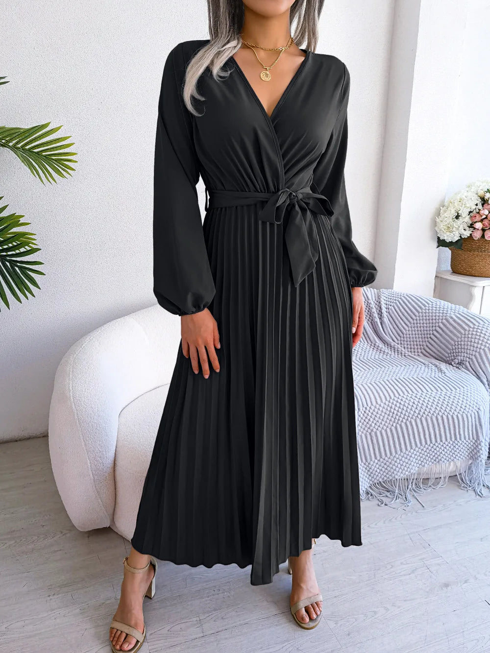 Women's flowing maxi dress deep V-neck long sleeves soft pleats relaxed silhouette floor-length