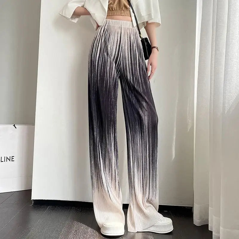 Women's ombre fade wide-leg pants with micro-pleated texture and cinched high waist streetwear style