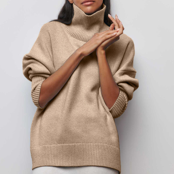 Women's relaxed turtleneck sweater in winter tones, cozy fit with defined high neckline for modern style