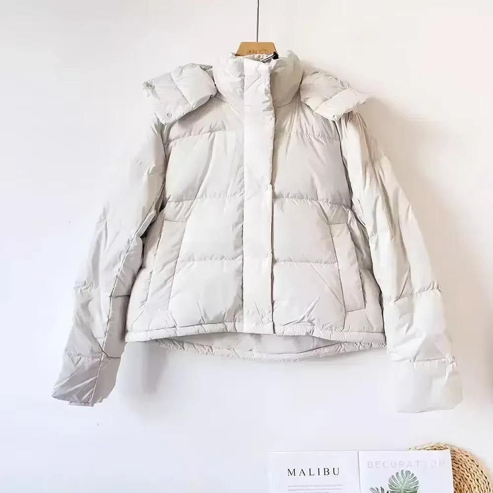 Women's thickened puffer down jacket with detachable hood in urban chic style for cold weather