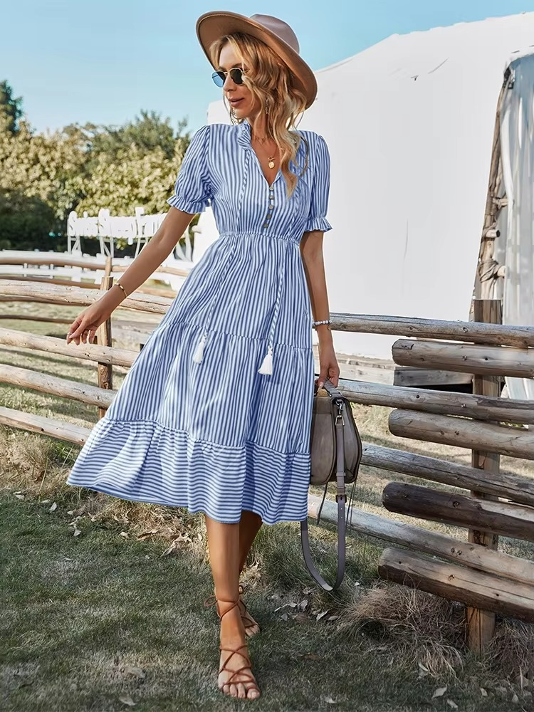 Striped v-neck midi dress with short sleeves and tassel details, effortless summer style