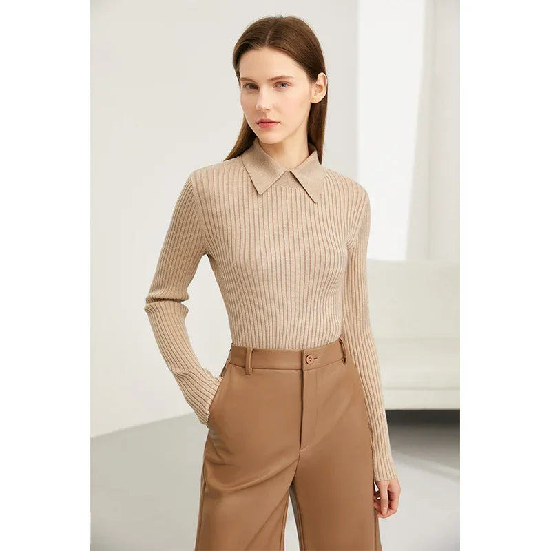 Women's ivory wool blend polo shirt with lapel collar, long sleeves, and figure-contouring stretchy knit fit