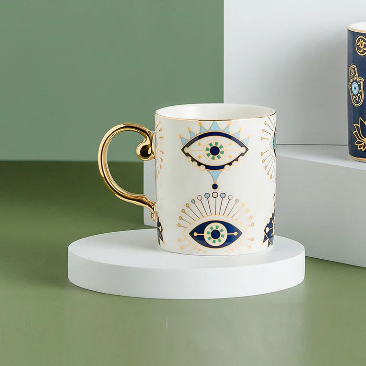 Evil Eye ceramic coffee mug gold trim Turkish craft protection positivity symbol design