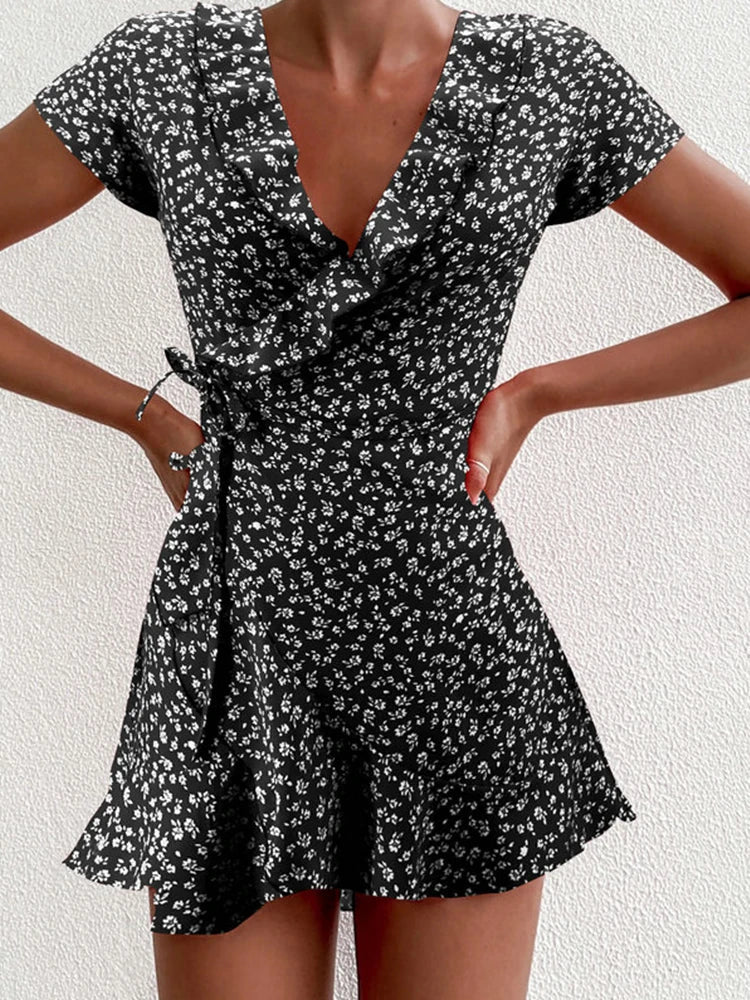 Floral wrap mini dress with ruffle-trim V-neck, A-line silhouette, bold print summer style