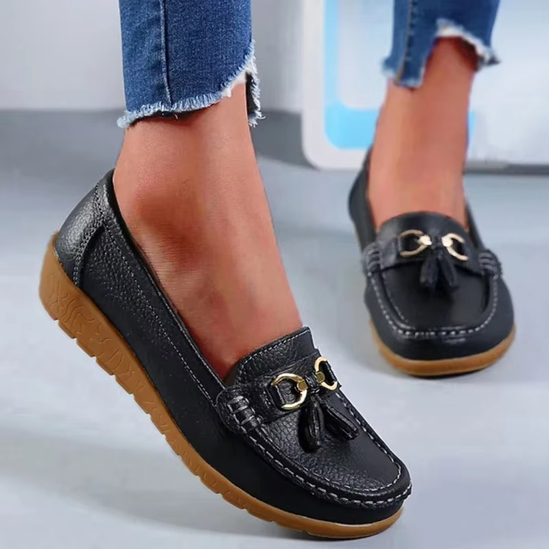 Black genuine leather women's slip-on moccasin flats with soft all-day comfort lining