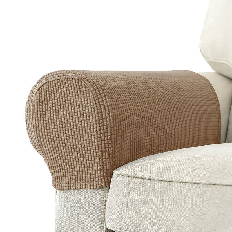 Gray textured stretch armrest cover for sofas, modern quilted design with waterproof spill protection