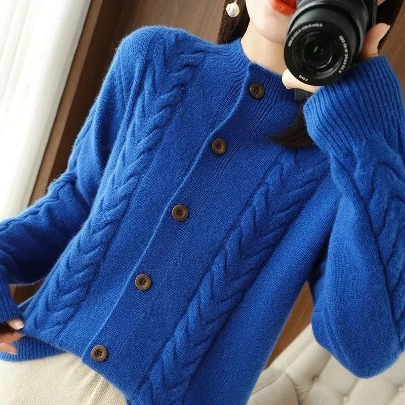 Women's ivory cable knit button-front cardigan with intricate texture pattern for versatile layering