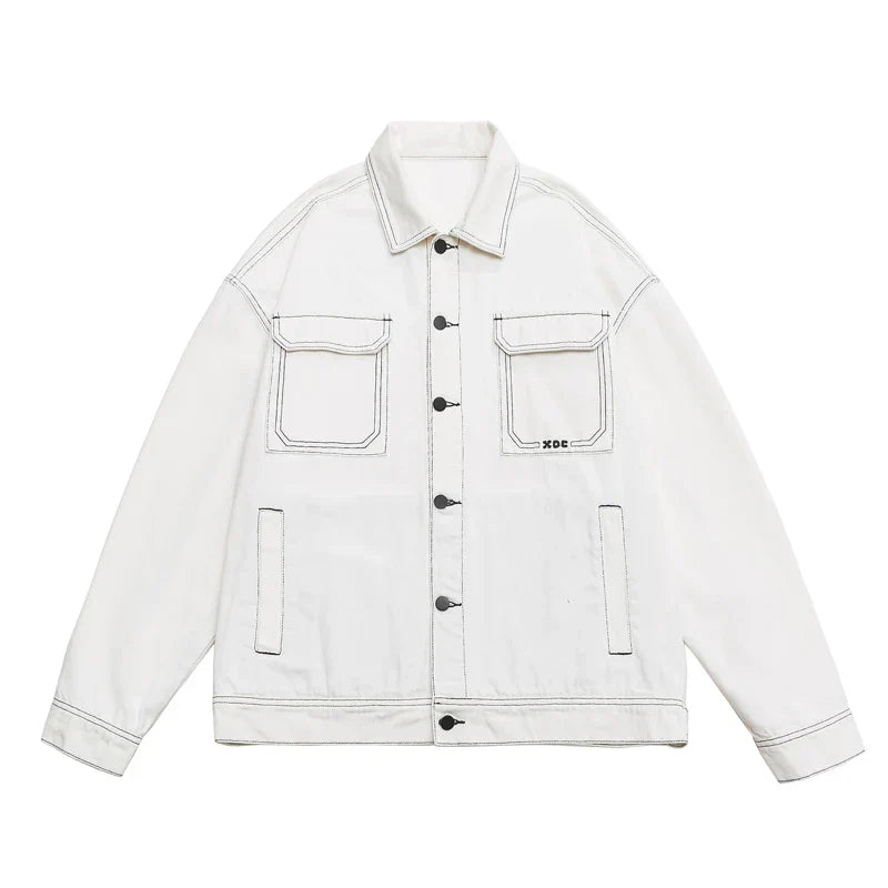 Black oversized unisex denim jacket with bold white stitch embroidery and multi-pocket design