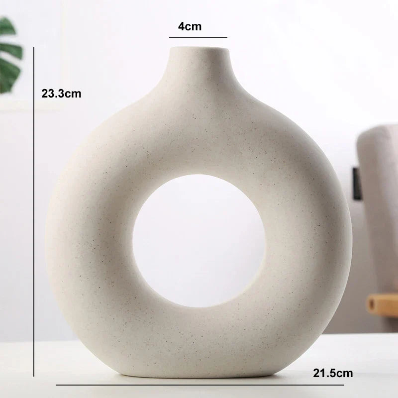 Stone-textured ceramic circular vase in natural calming tones, minimalist home decor accent