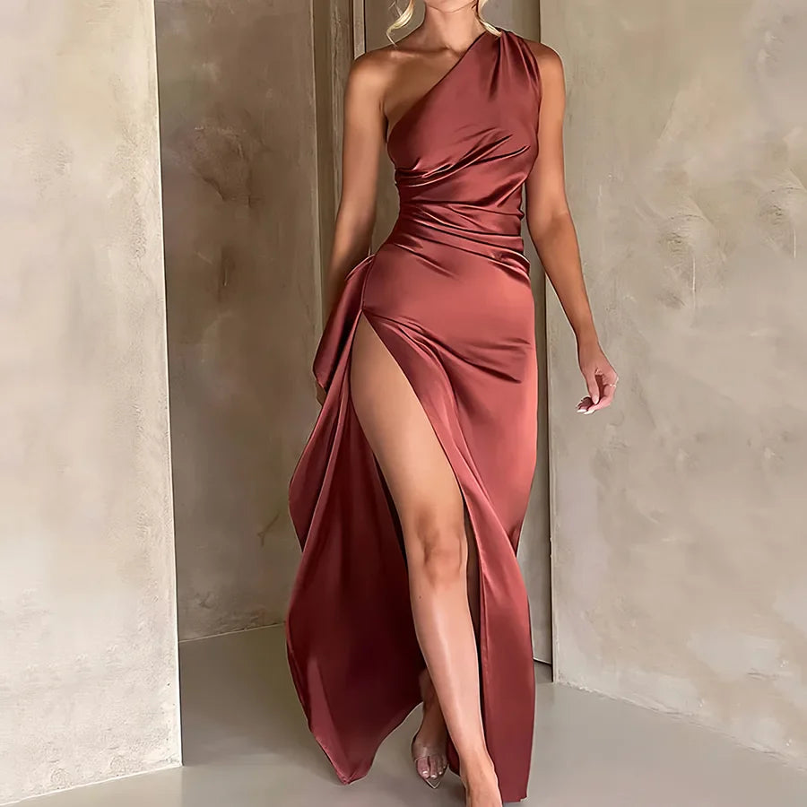 Lily one-shoulder satin dress in sleek silhouette with ruched waist and daring thigh-high slit