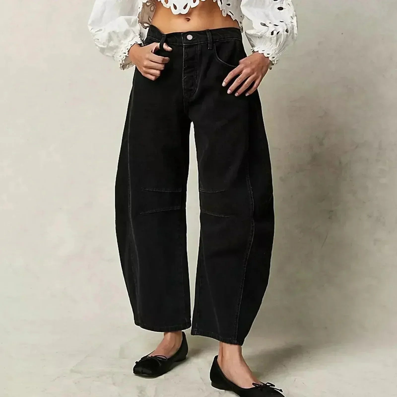 Women's relaxed fit high waist pants in neutral tone with flattering wide-leg silhouette for all-day comfort
