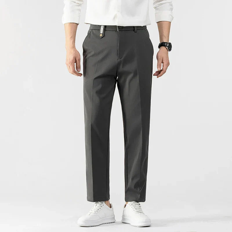 Men's slim fit lightweight dress pants in neutral tone, tailored cut with all-day comfort for office wear