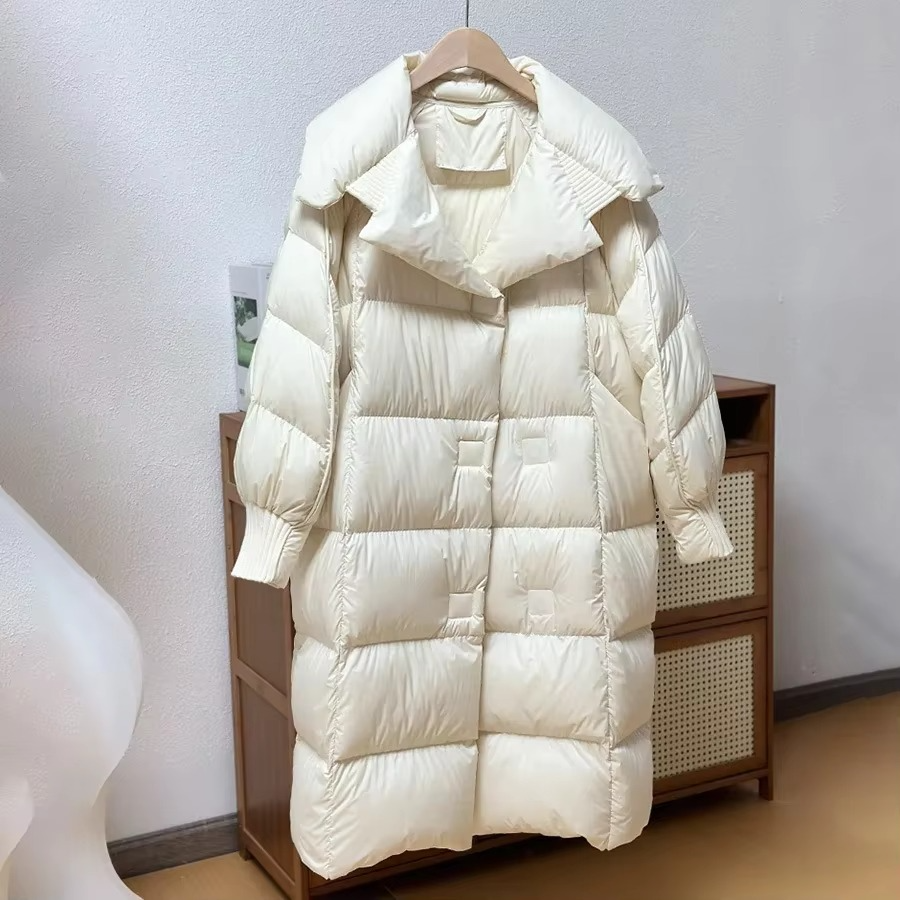Women's oversized long down coat in neutral tone, premium white duck down fill winter outerwear