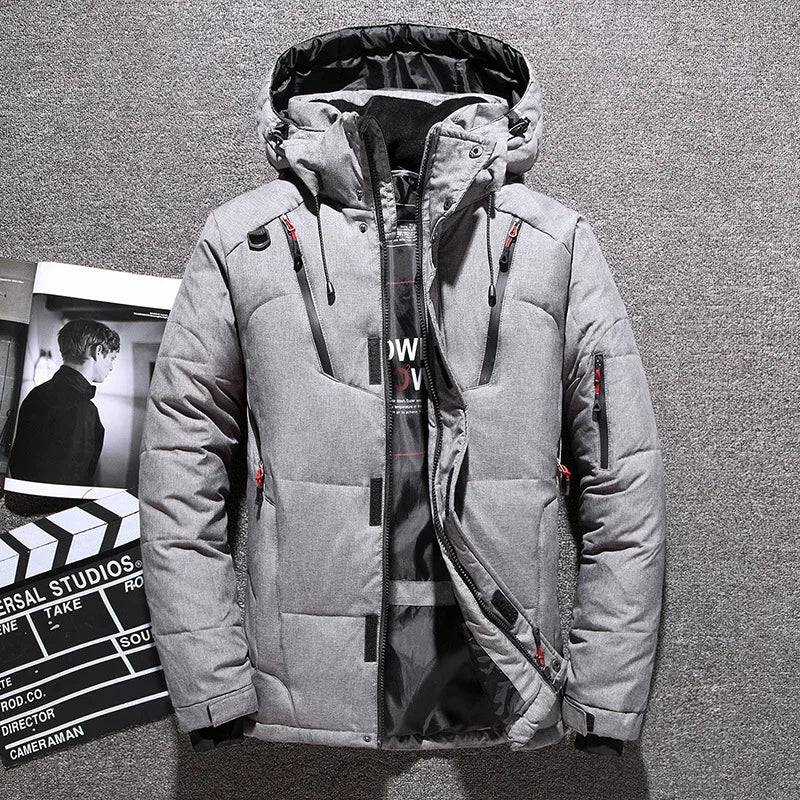 Men's black mid-length puffer jacket with detachable hood and durable polyester shell