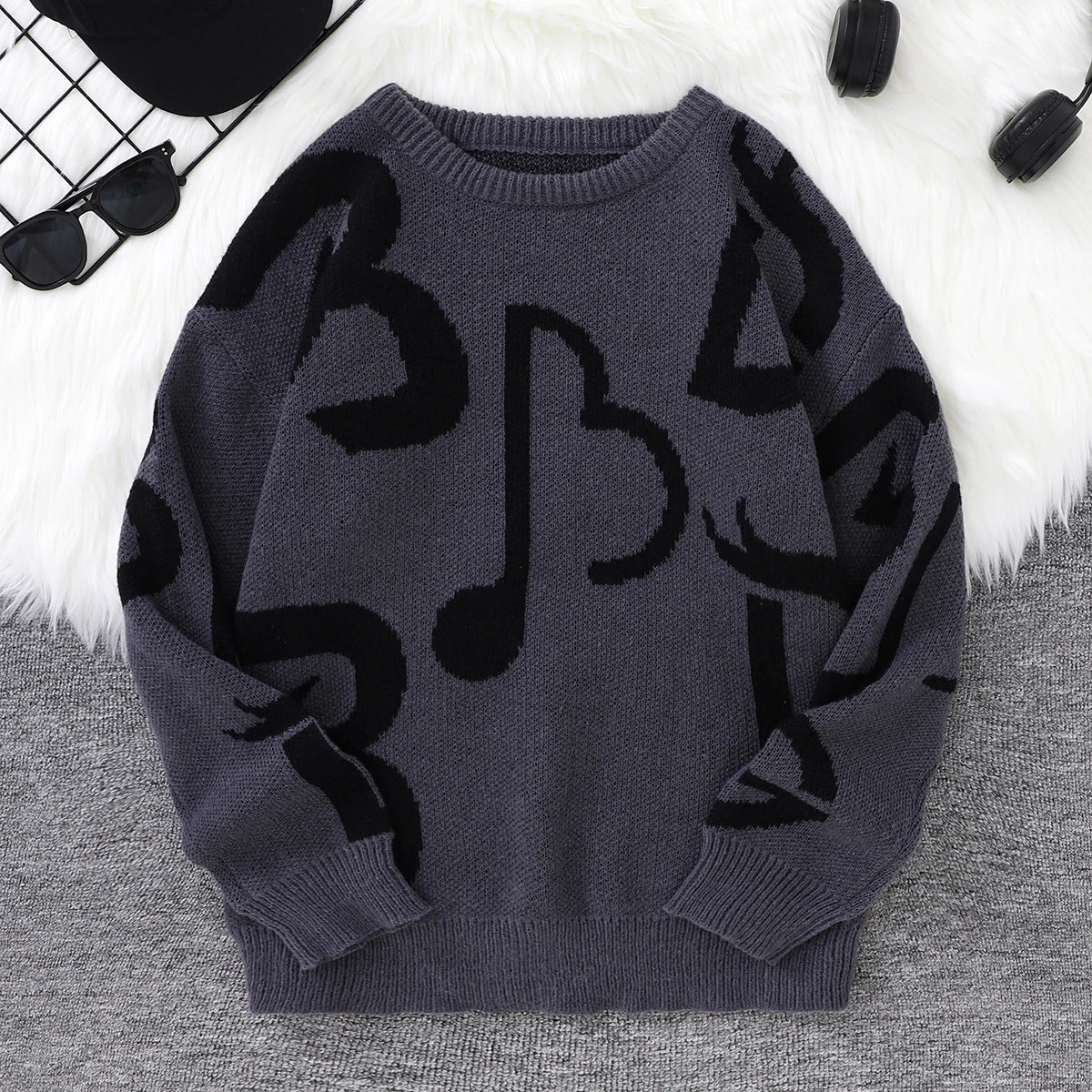 Black white music note pattern knit sweater oversized cozy soft bold musical graphic design