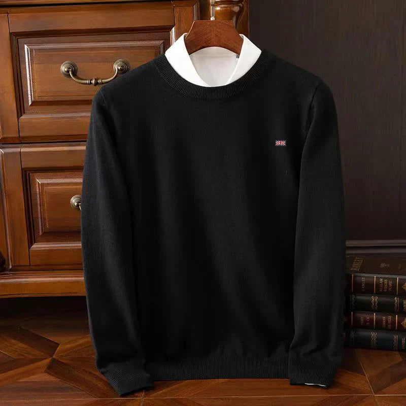 Lightweight cream crewneck knit sweater with smooth fine-knit texture and ribbed details for men and women