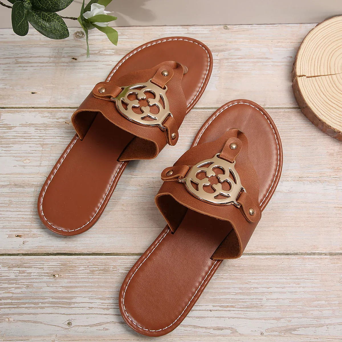 Women's open-toe summer sandals in neutral tone with sleek flat silhouette and breathable everyday comfort