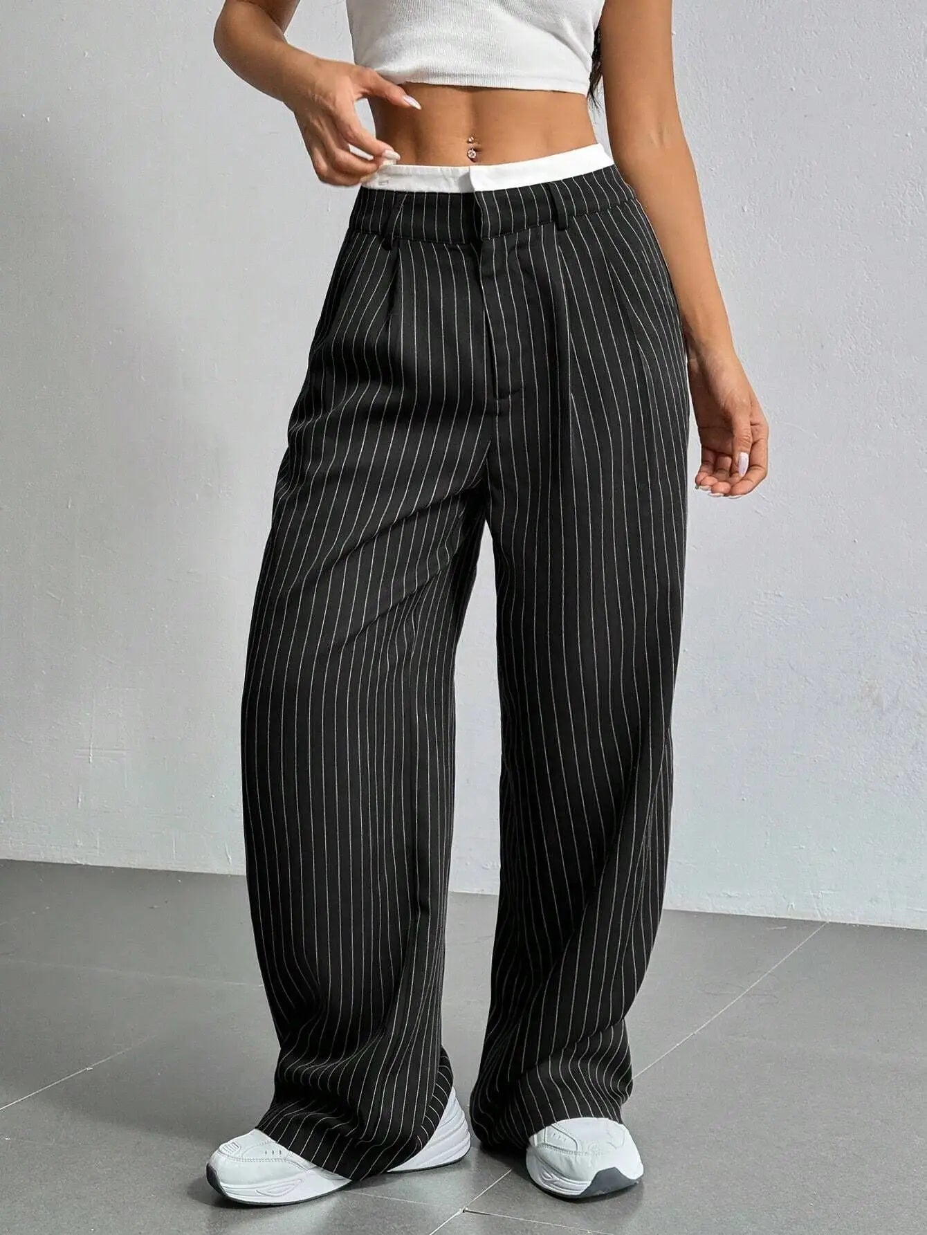 Women's high-waist pinstripe dress pants with slight stretch tailoring for desk-to-dinner versatility