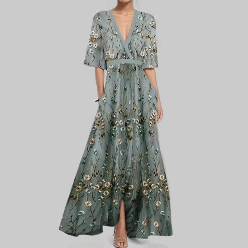 Women's ankle-length printed pleated dress with V-neck, flowing silhouette in elegant timeless style