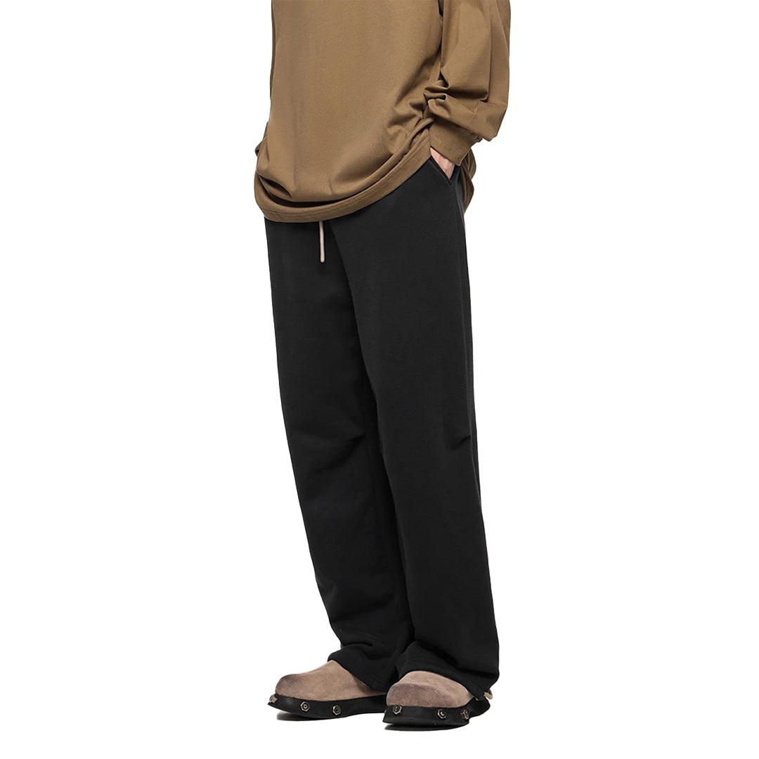 Men's relaxed fit heavyweight cotton sweatpants in neutral tone with refined drawstring waist