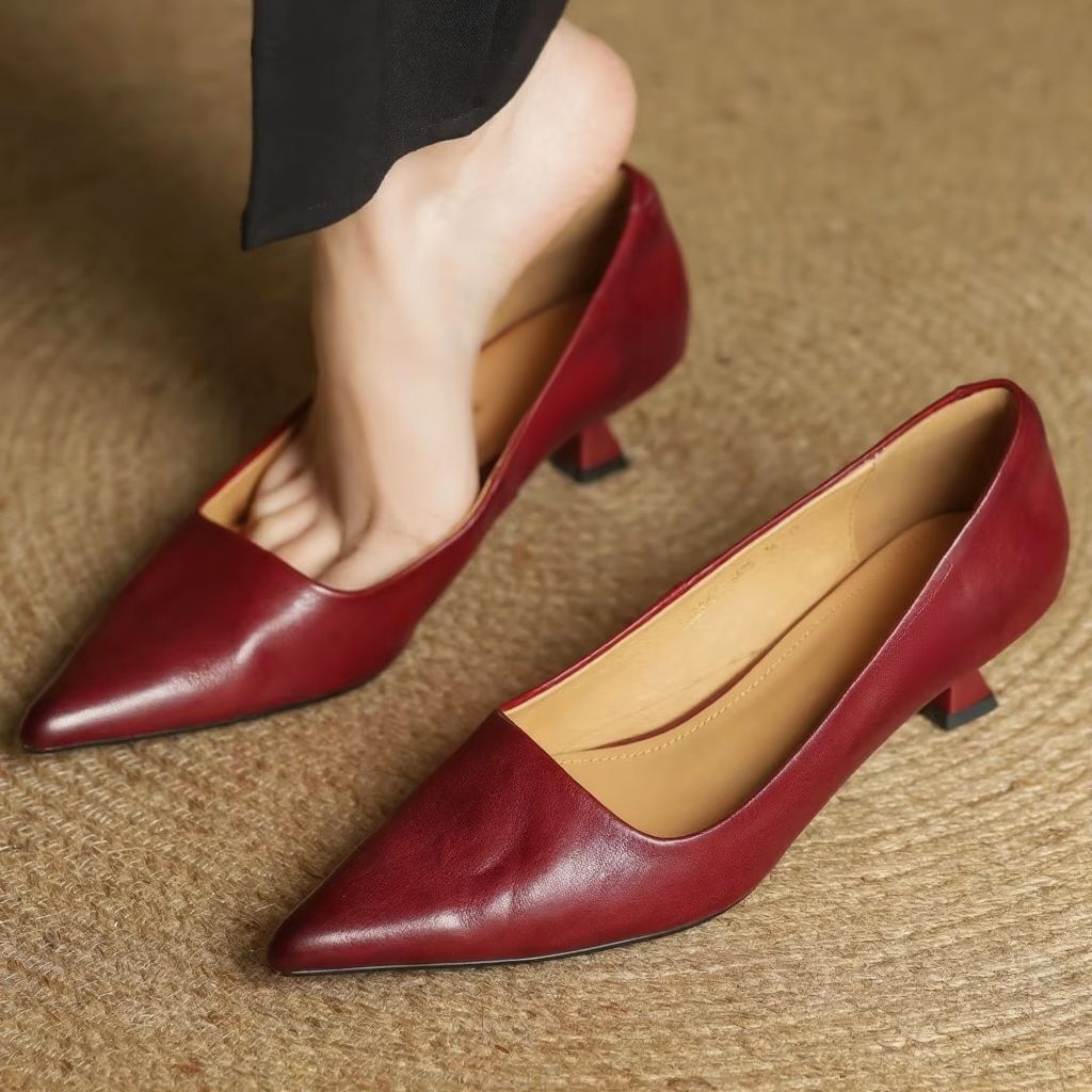Women's genuine leather pointed toe slip-on pumps in classic professional style with sleek silhouette