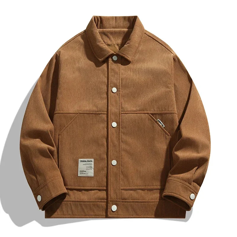 Retro 90s brown corduroy trucker jacket with textured finish and classic relaxed silhouette