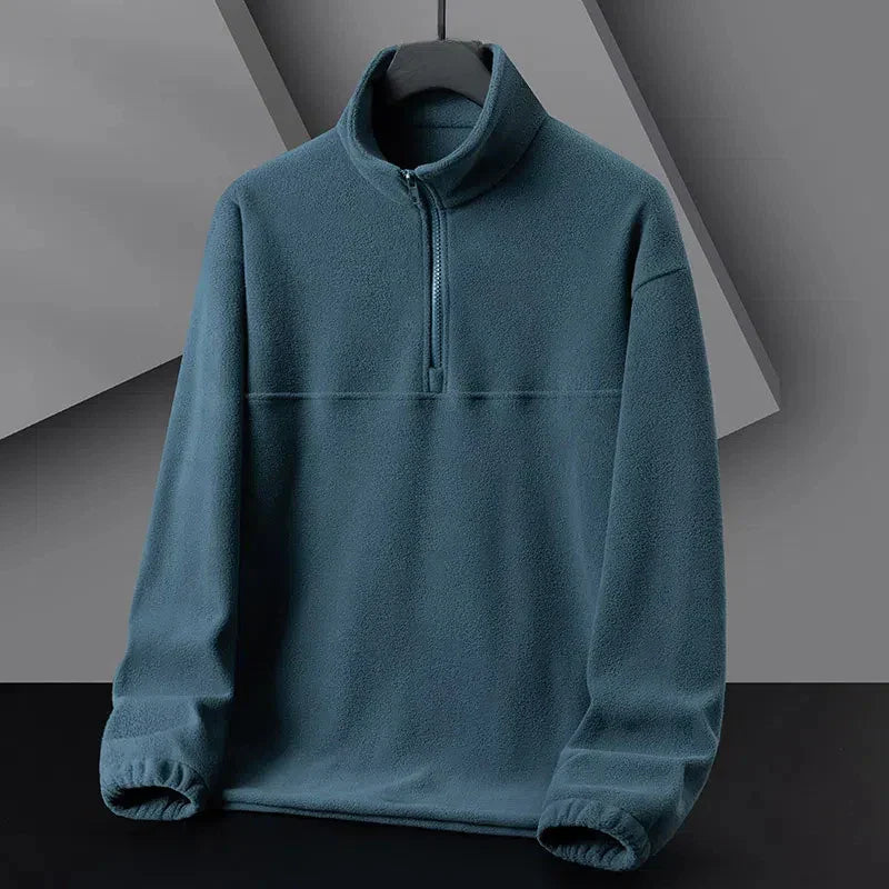 Heather gray half-zip fleece pullover minimalist high collar ultra-soft texture everyday comfort