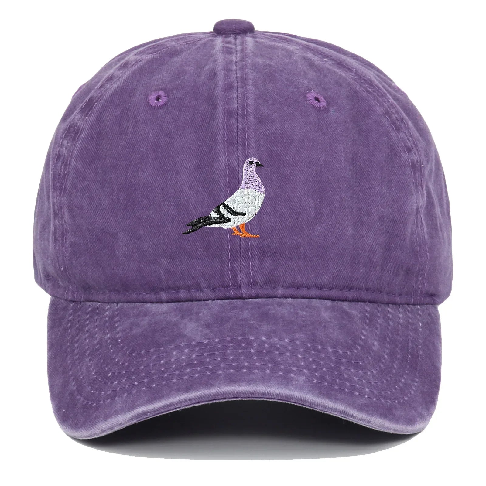 Washed cotton unisex cap in vintage tones with embroidered pigeon motif and adjustable fit