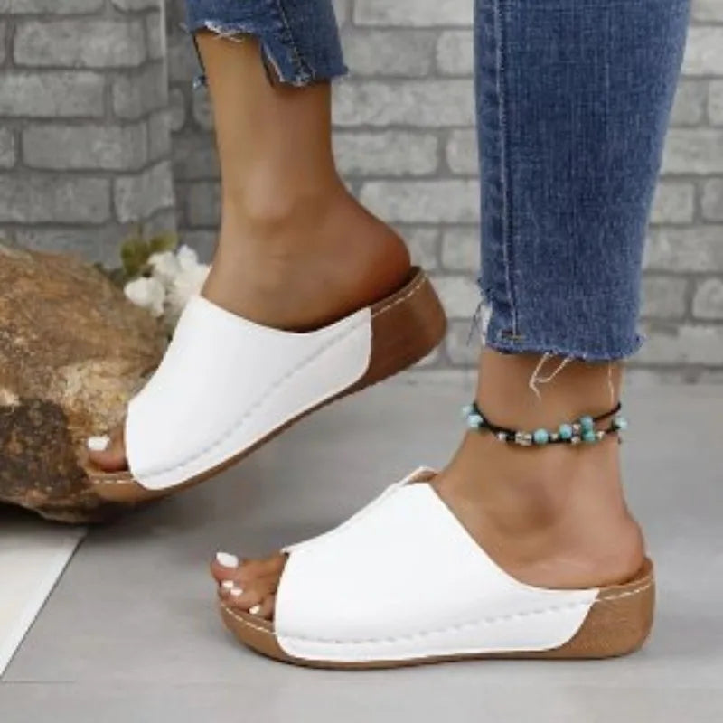 Women's red platform wedge slides with contrast stitching, casual open-toe summer footwear for all-day comfort