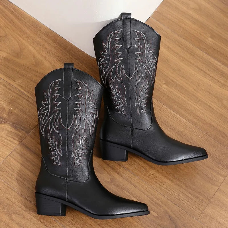 Women's brown mid-calf western boots with pointed toe, block heel, and classic stitching detail