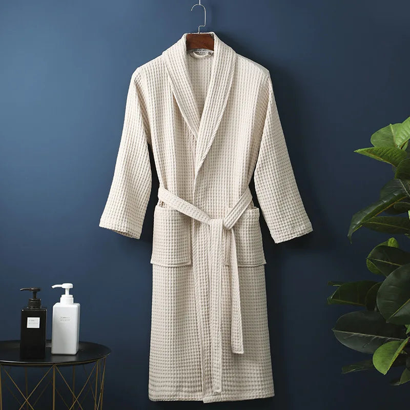 Women's spring waffle lounge robe in neutral tone, relaxed wrap silhouette with adjustable tie belt