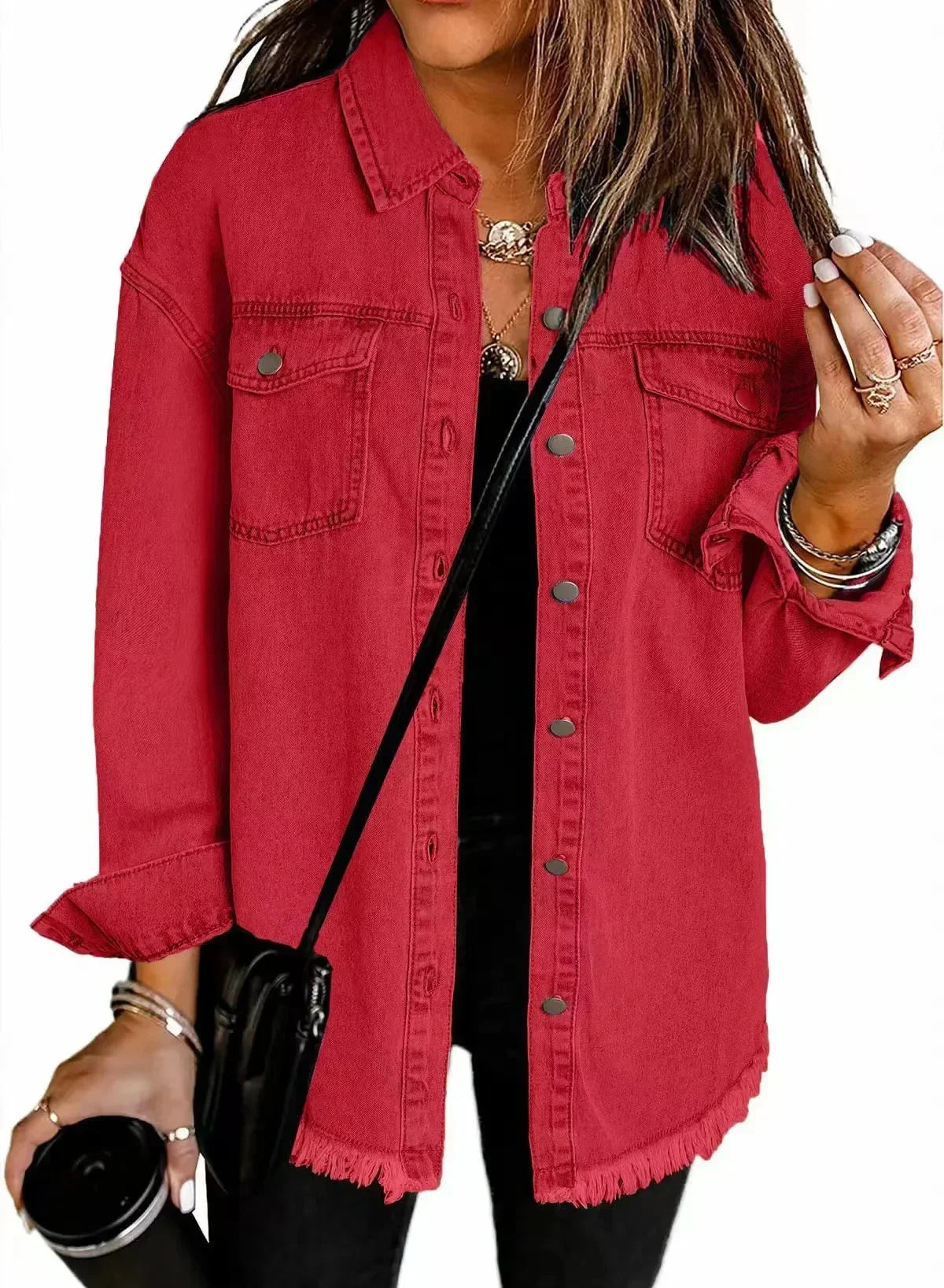 Women's relaxed fit washed denim shirt jacket with button-down front, chest pockets, and fringe hem