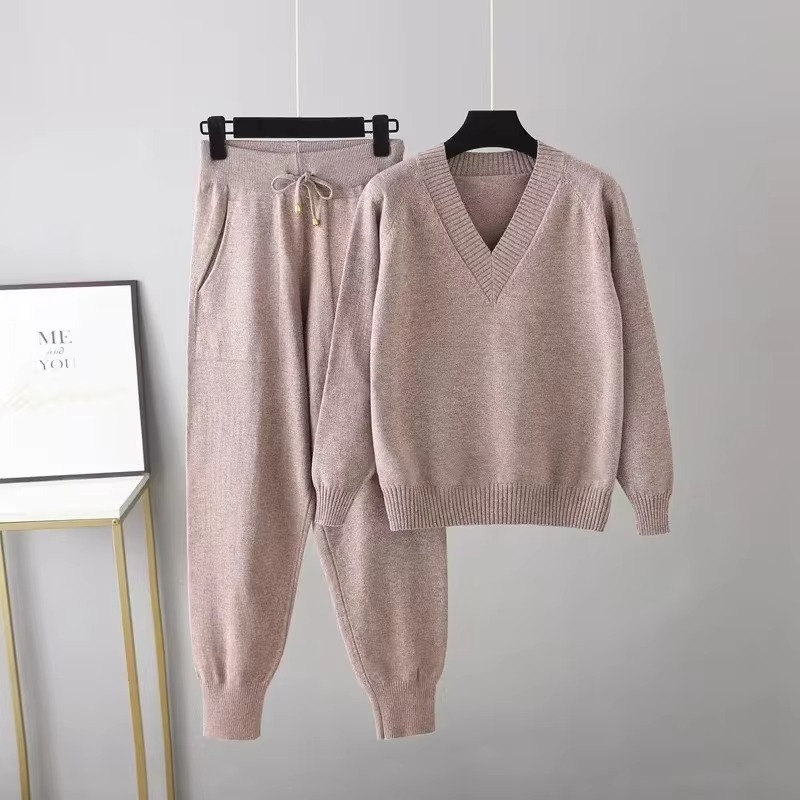 Women's knitted V-neck sweater and pants two-piece set in soft autumn tones relaxed cozy winter coord