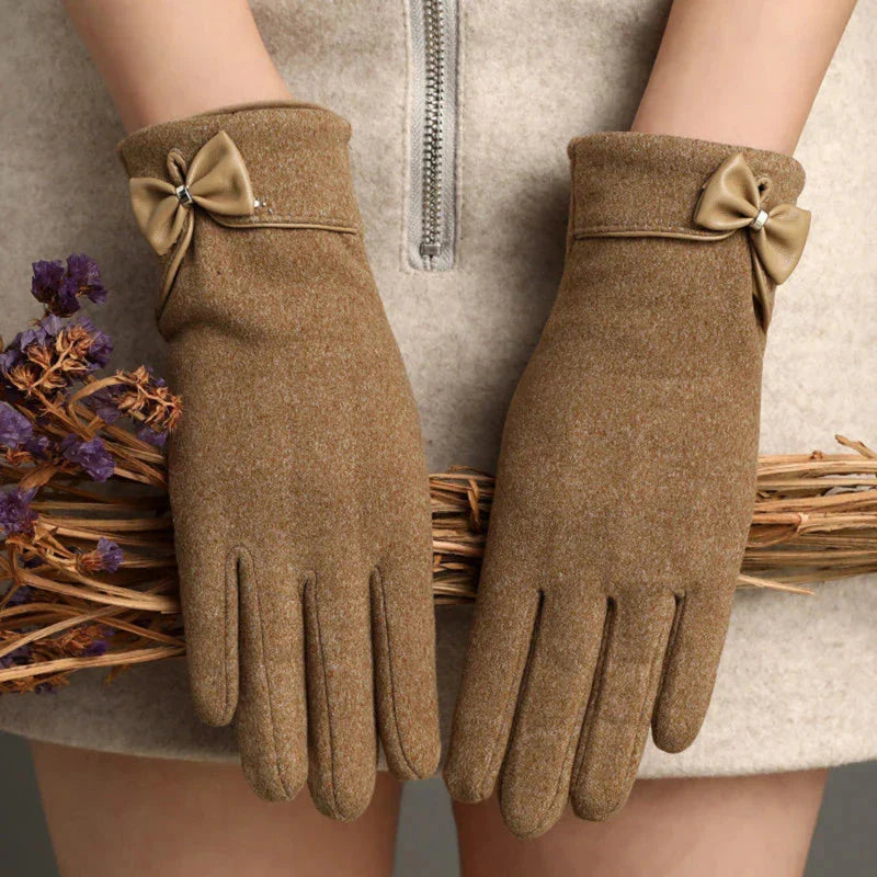 Women fitted wool wrist-length gloves in classic color with elegant bow detail accent