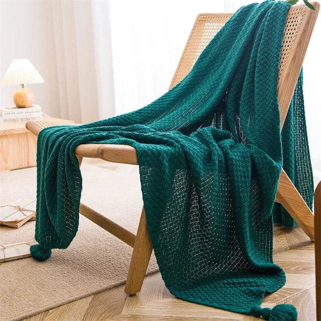Ultra-soft handknit Nordic throw blanket with tassel trim, cozy breathable knit for beds and couches