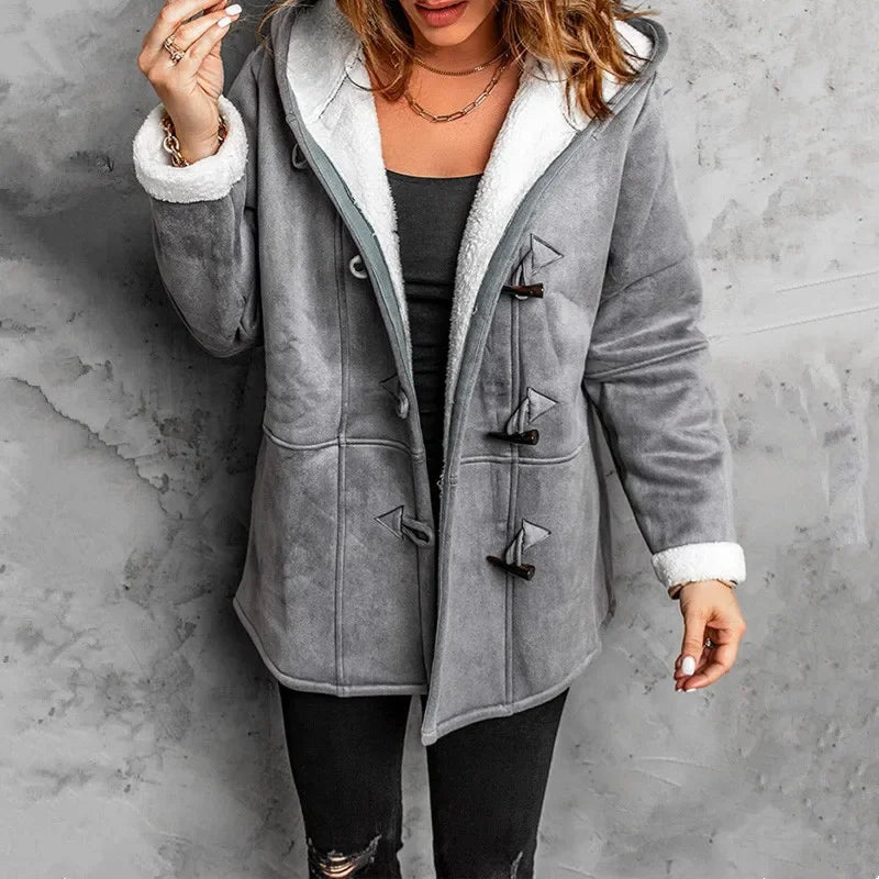 Hooded unisex winter coat with plush fleece lining, toggle closures, and cozy oversized fit