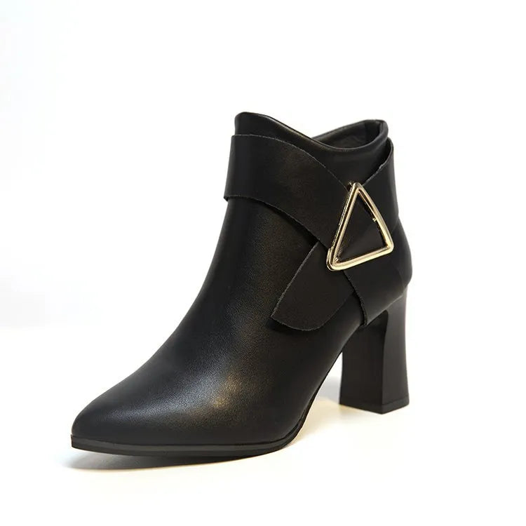 Women's black high heel boots with sleek silhouette and distinctive geometric triangle buckle accent