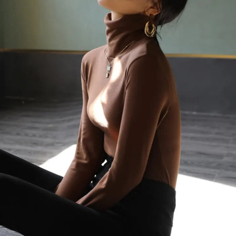 Women's velvet turtleneck sweater in luxurious cozy style with elegant lacy collar detail